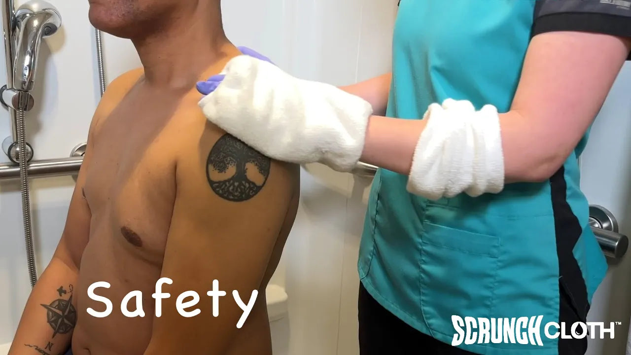 Load video: Safe and easy partial baths using multiple scrunch clothes preloaded on care giver&#39;s arm